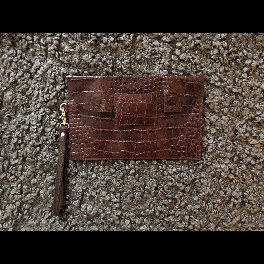 Leather medium wristlet purse.